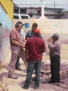 Bruce discusses plan with guys