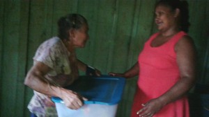 Gloria shares basket of food with Widow